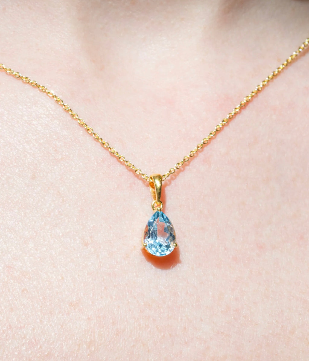 Tennis Bracelet with iolite and pendant with Topaz
