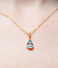 Tennis Bracelet with iolite and pendant with Topaz